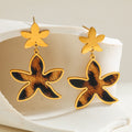 Leopard star earrings